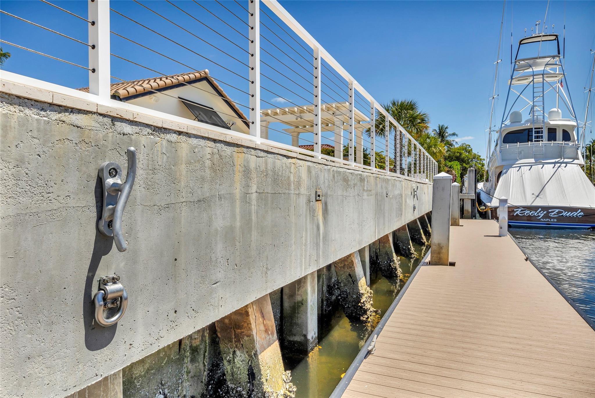 Newly installed & upgraded seawall, batter pilings, seawall cap with proper mooring cleats for your yacht