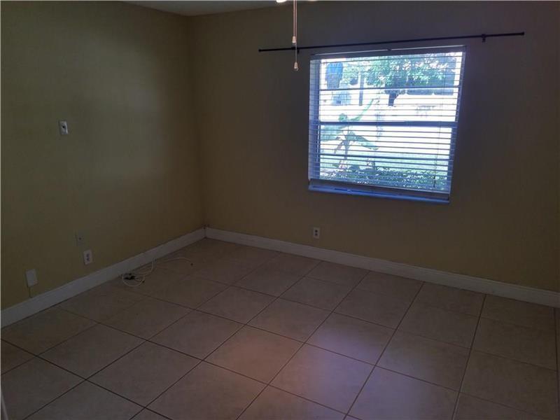 8750 Royal Palm Boulevard 106, Coral Springs, FL 33065