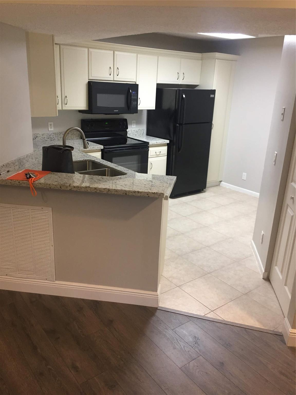 8721 Wiles Road 102, Coral Springs, FL 33067