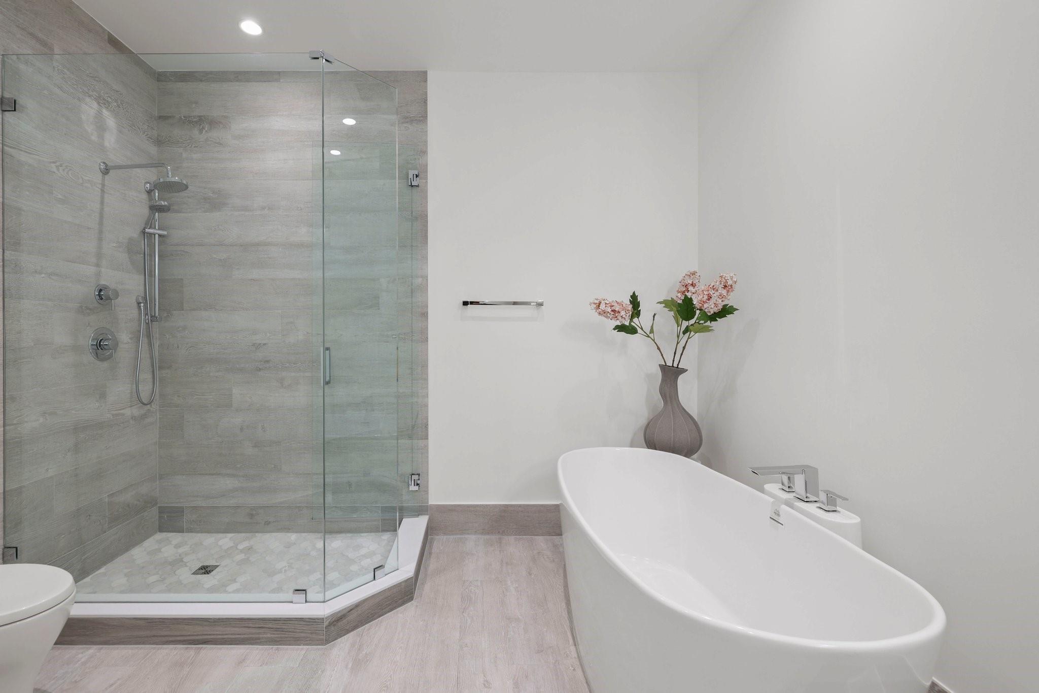 Large shower plus separate free standing bathing tub