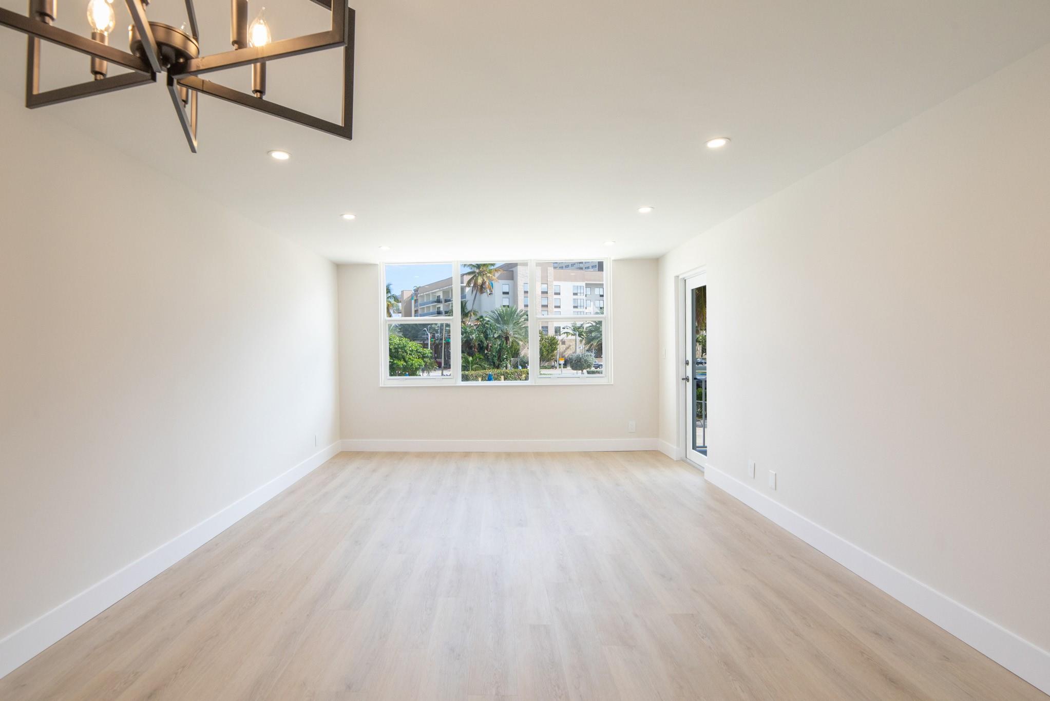 Living-Room Luxury Vinyl Plank through the unit