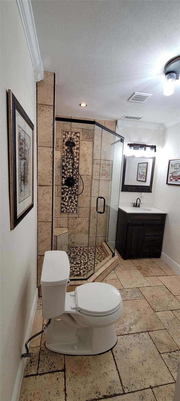 Updated bathroom featuring modern fixtures and finishes