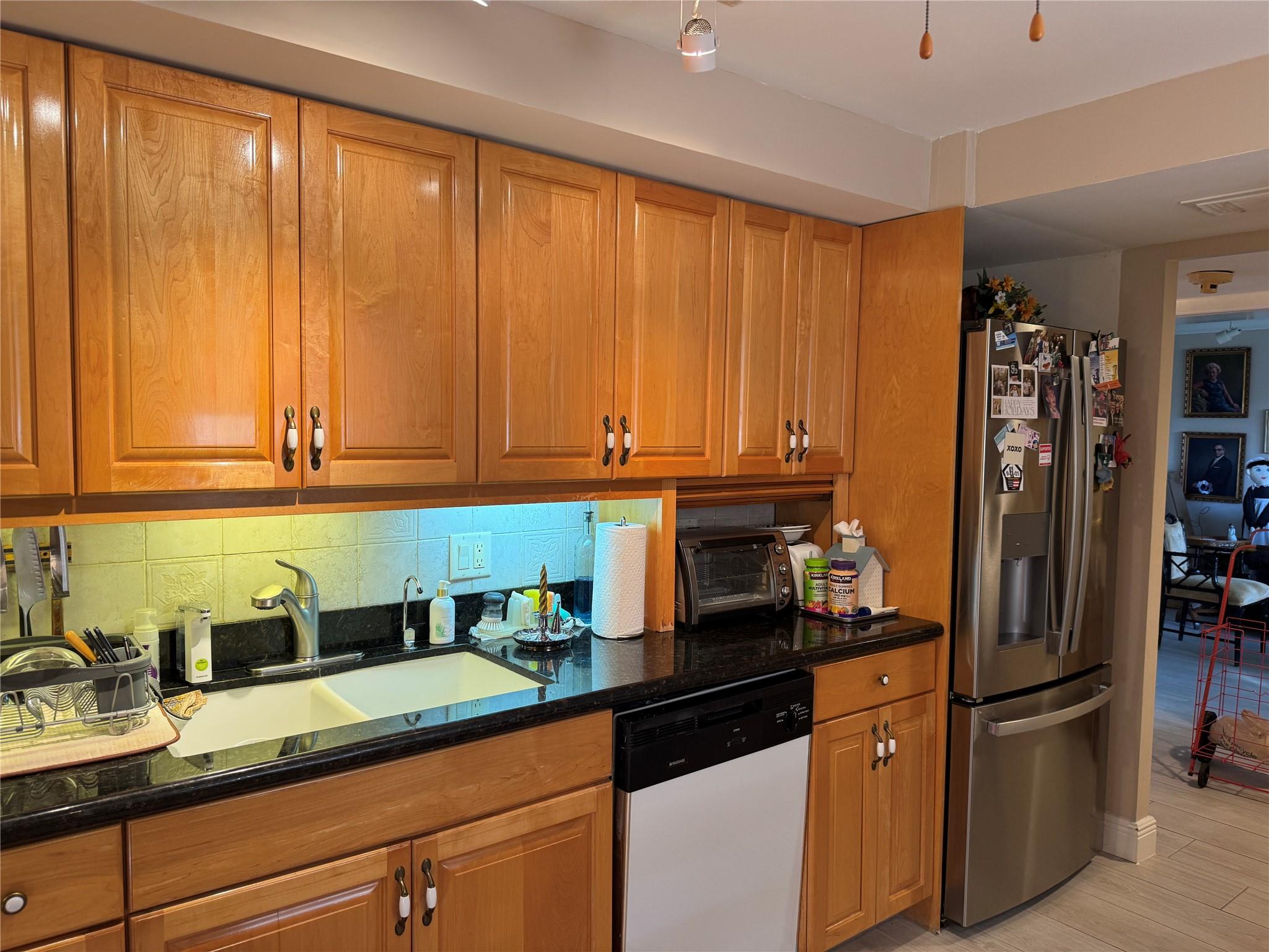 GRANITE COUNTERTOPS, NEW SINK AND ALL WOOD CABINETS