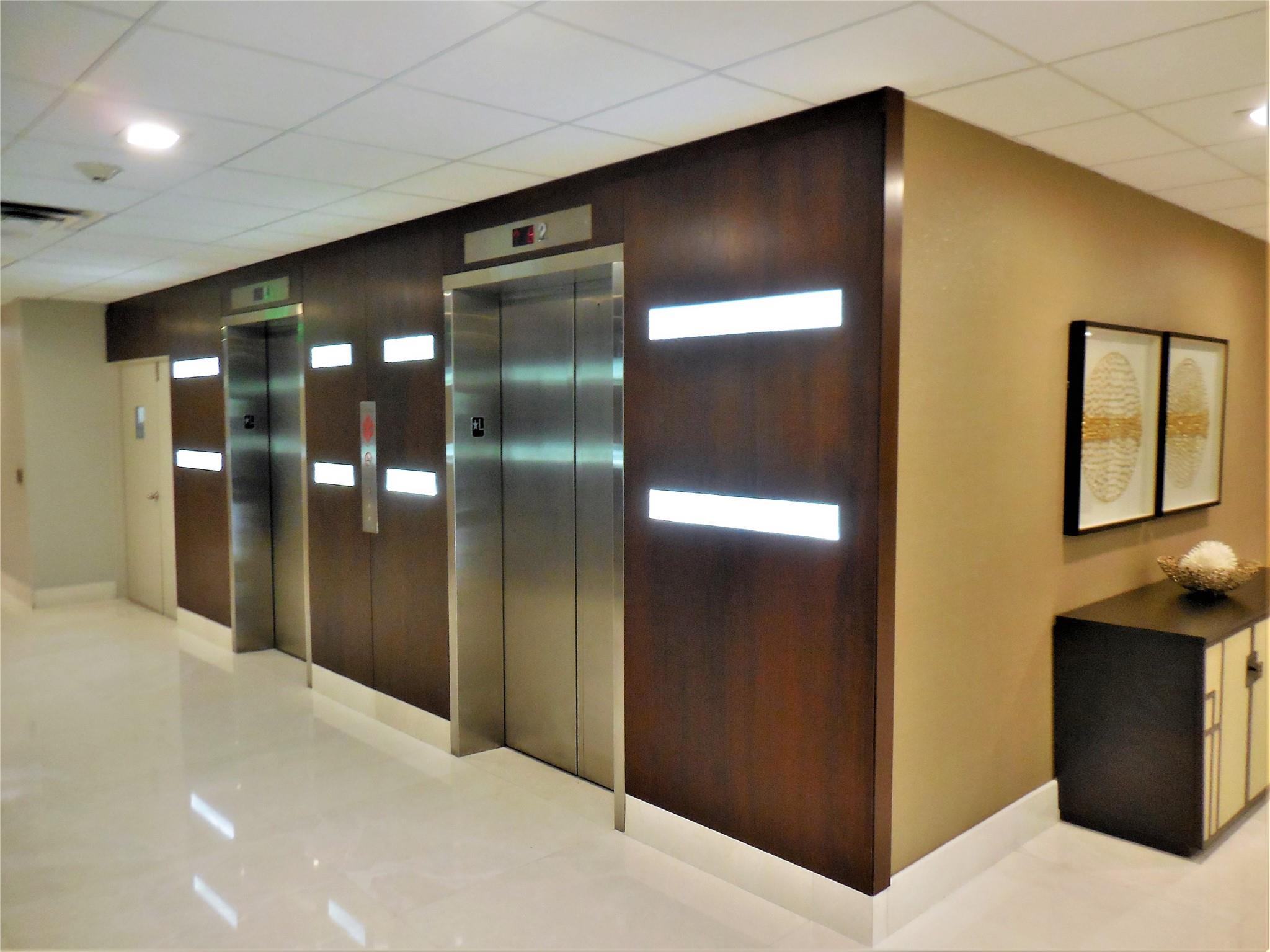 The central bank of newly renovated elevators.