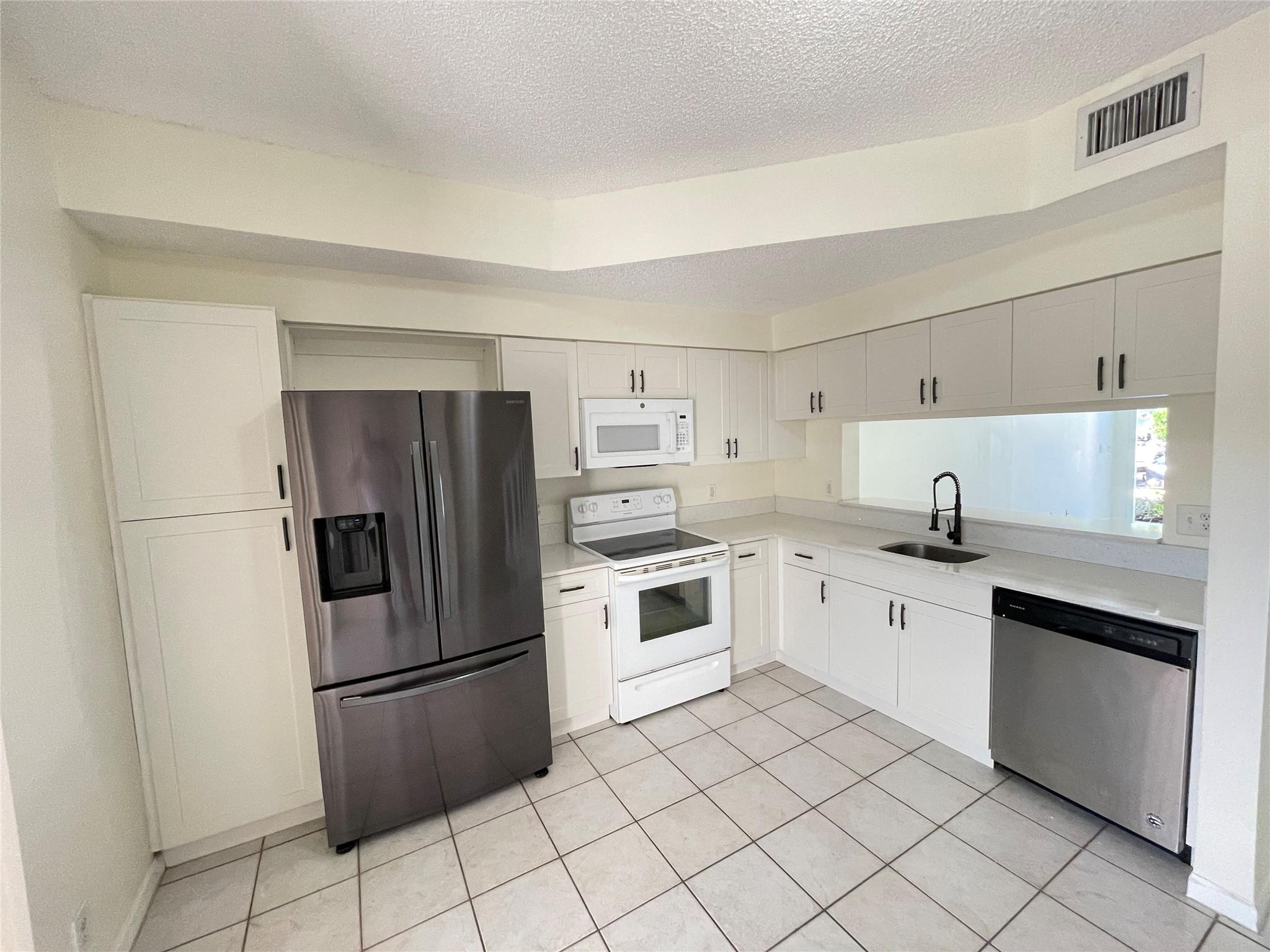 9844 NW 56th Place, Coral Springs, FL 33076