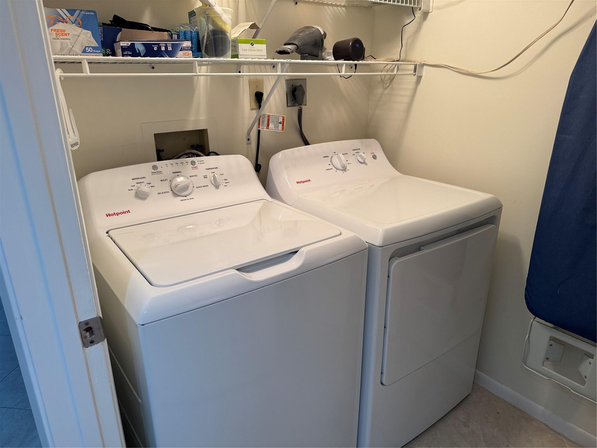 Laundry room with NEW full sized washer/dryer