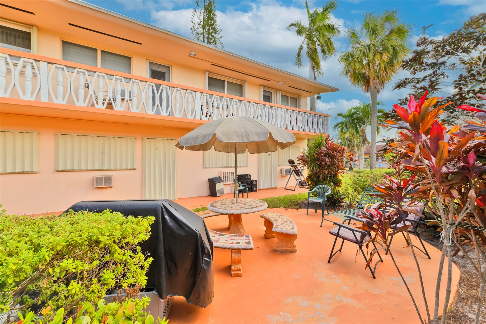 ANOTHER PATIO AREA BEHIND THE BUILDING