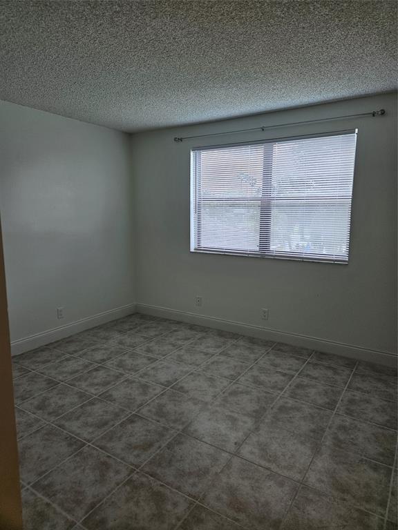 11453 NW 39th Court 211, Coral Springs, FL 33065