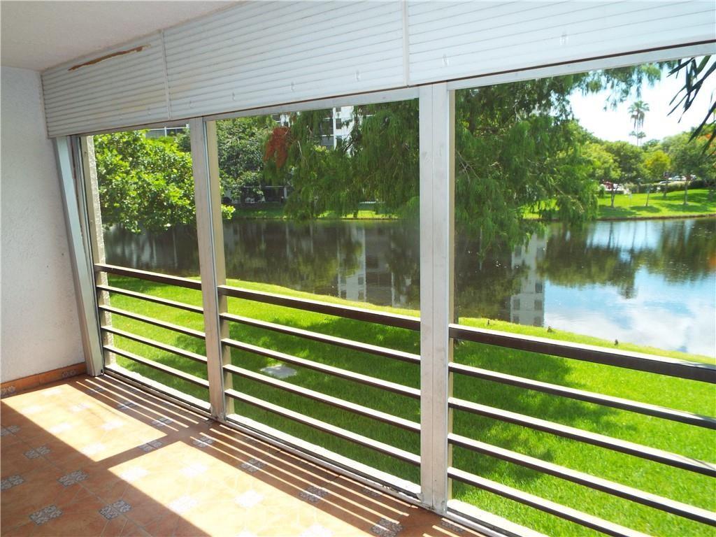 Photo for 2311 S Cypress Bend Drive, 219A, Pompano Beach, FL 33069 - Listing #FX-10412204 of the beautiful water from both bedrooms & Living room