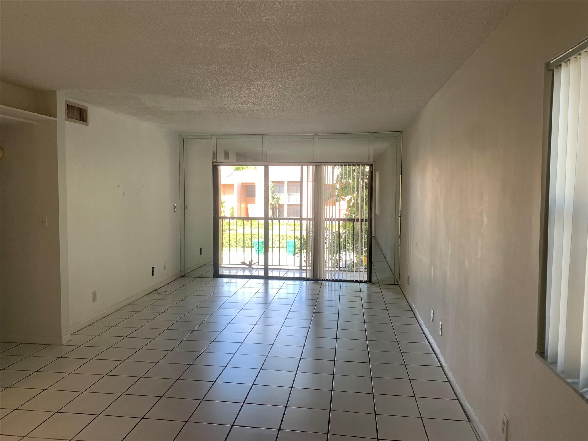 9150 NW 38th Drive 212, Coral Springs, FL 33065