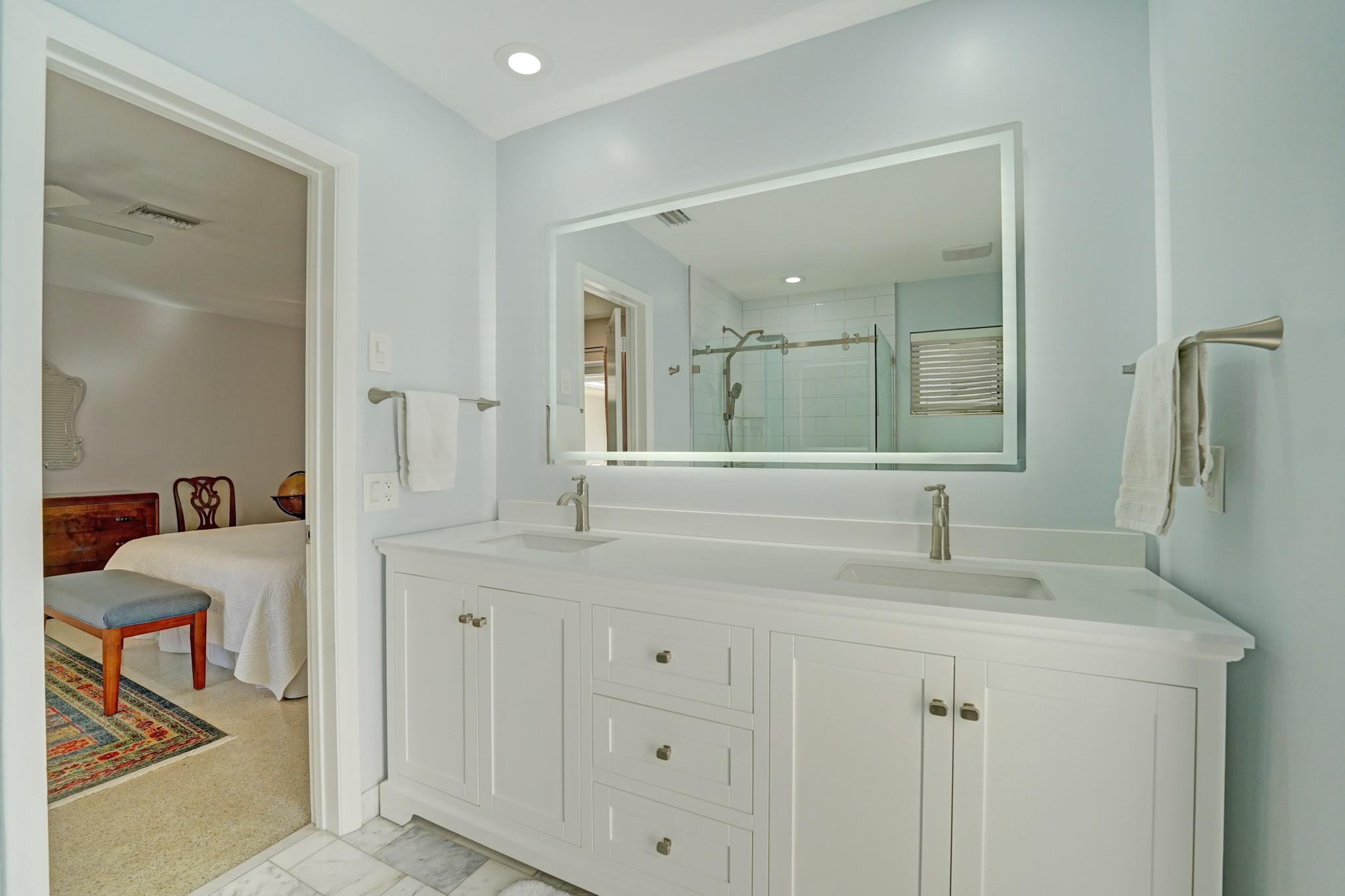 Primary bath with dual sinks.