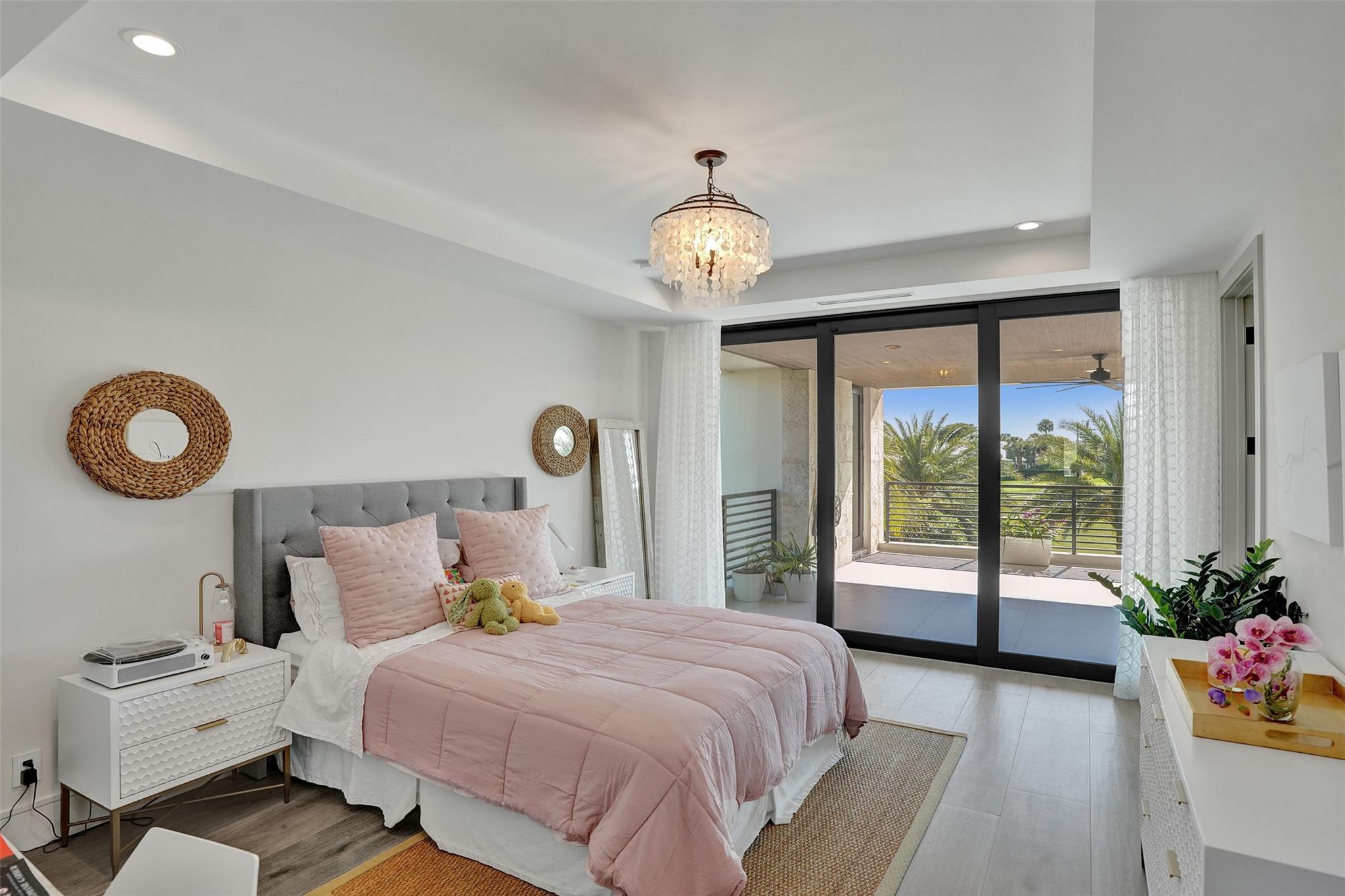 Upstairs suite overlooking the golf course and balcony access.