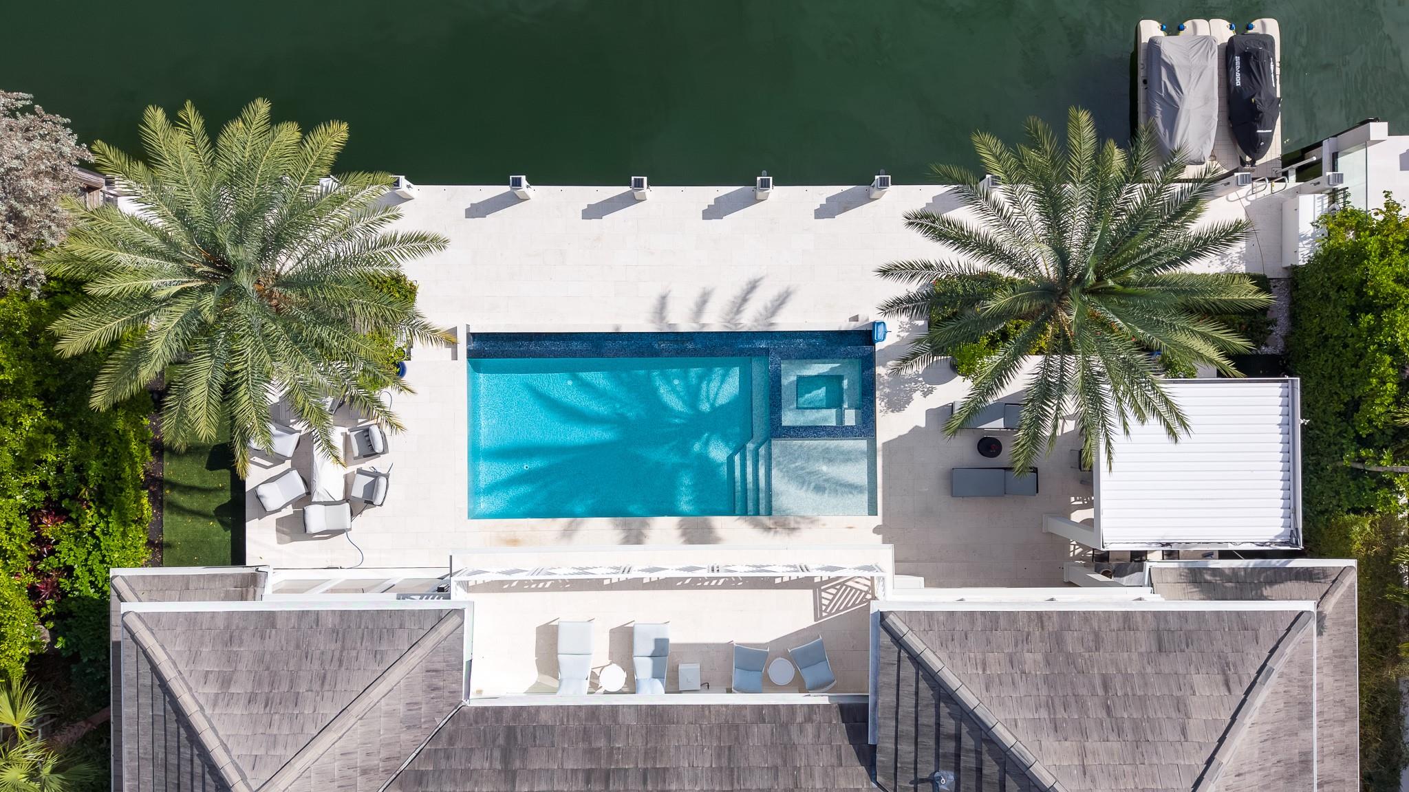 Enjoy waterfront views from your heated, saltwater pool.