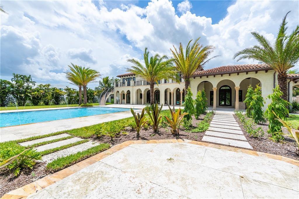 BACK OF THE HOUSE AND POOL