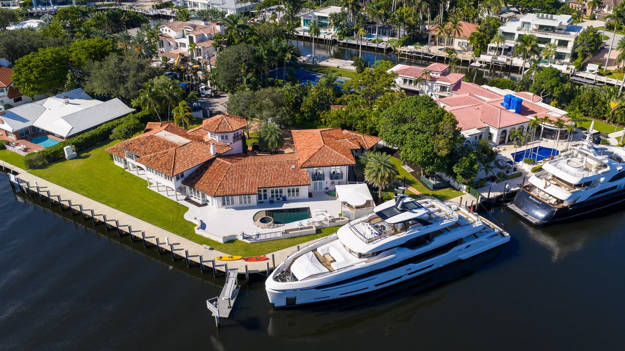 Expansive point-lot estate with 315 feet of waterfront, skyline views, and mega-yacht dockage along Fort Lauderdale’s premier waterways.