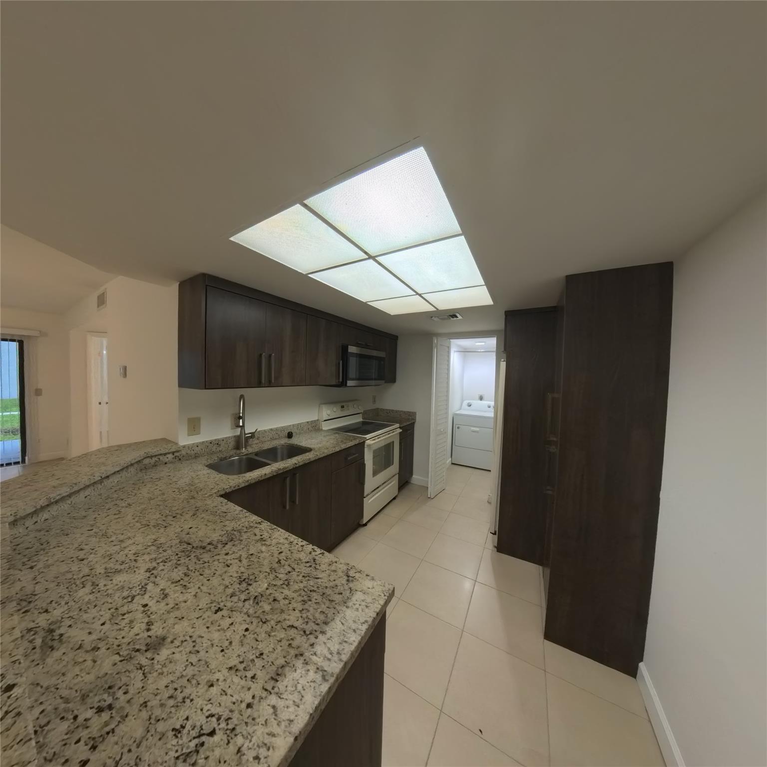Photo for 9166 W Atlantic Boulevard 1618, Coral Springs, FL 33071 - Listing #FX-10540411 Granite counter top and new kitchen cabinets