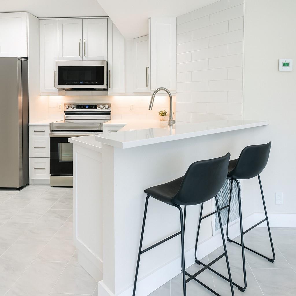 9055 Wiles Road 208, Coral Springs, FL 33067