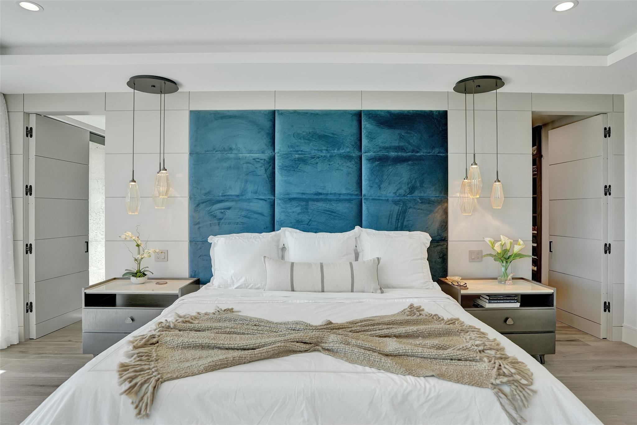 Panel door on left is gym, door on right is his closet