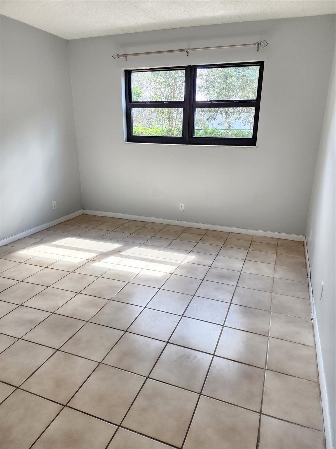 9150 NW 38th Drive 106, Coral Springs, FL 33065