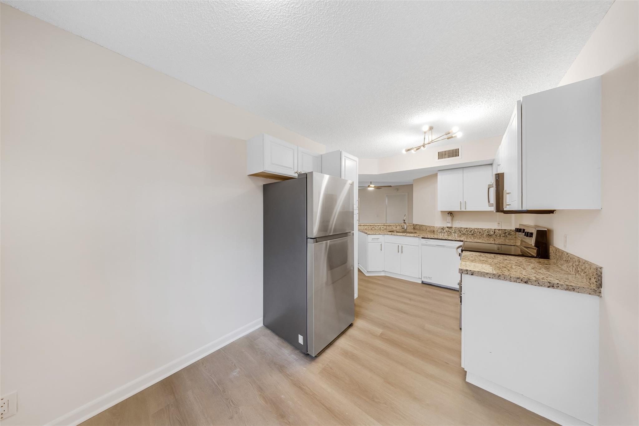 8977 Wiles Road 102, Coral Springs, FL 33067