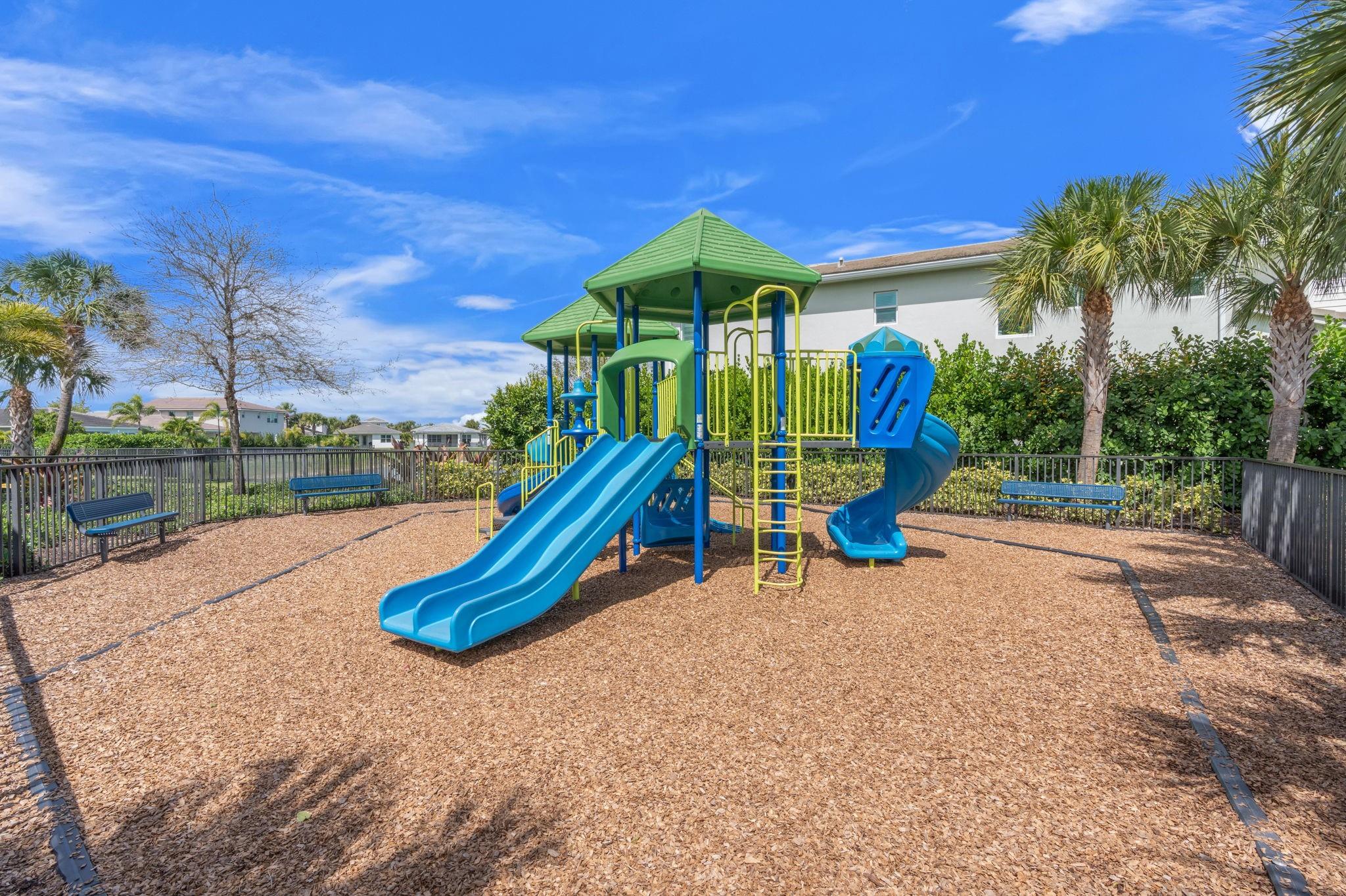 Well Designed Playground is Fully Fenced and has Comfortable Benches to Sit and Watch the Little Ones.
