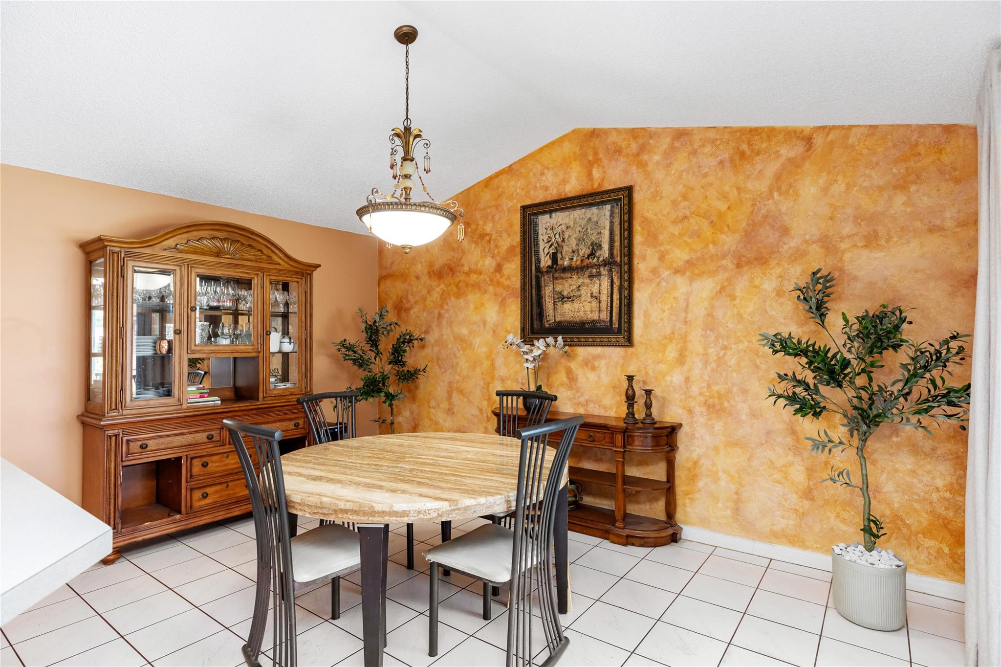 Vaulted ceilings and sliders to outdoor pool