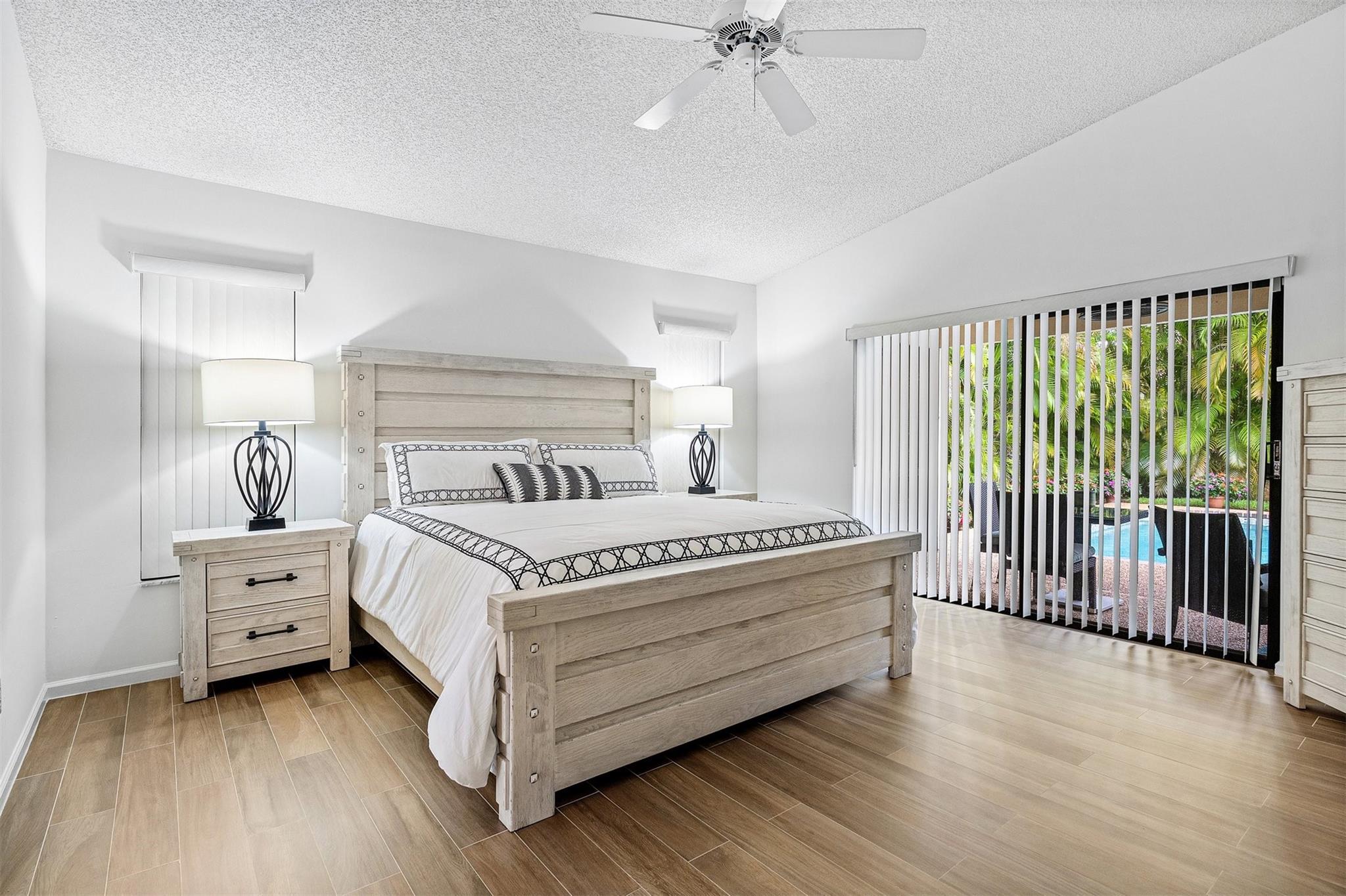 Light, bright Primary bedroom with upscale laminate flooring!