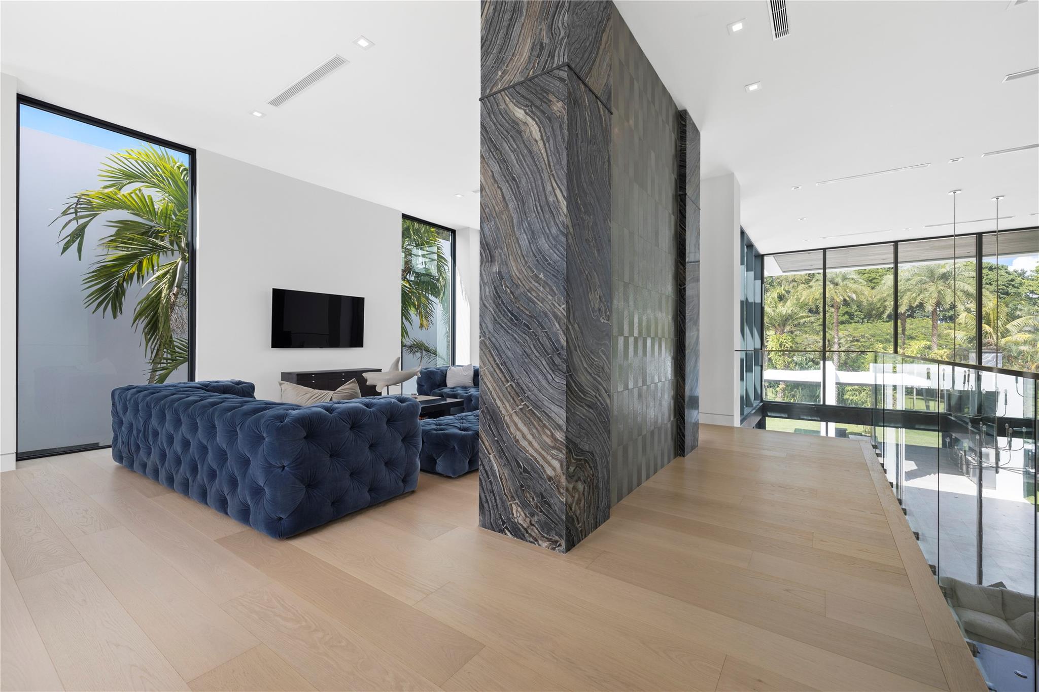 2nd Floor Loft with Balcony overlooking 1st floor living room and kitchen