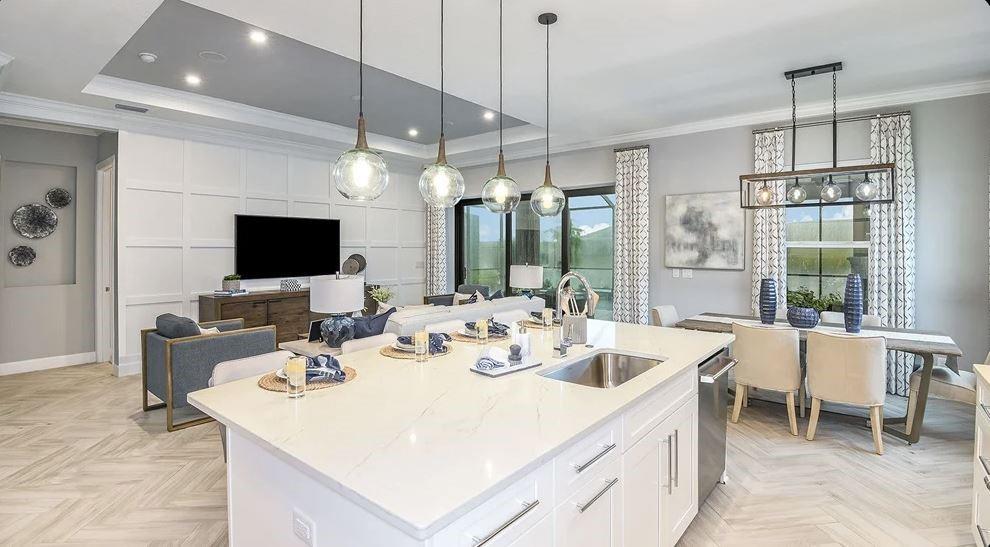 Additional highlights include: tray ceilings, additional bedroom with bathroom, pocket sliding glass door to outdoor living, study, rough-in plumbing for future outdoor kitch