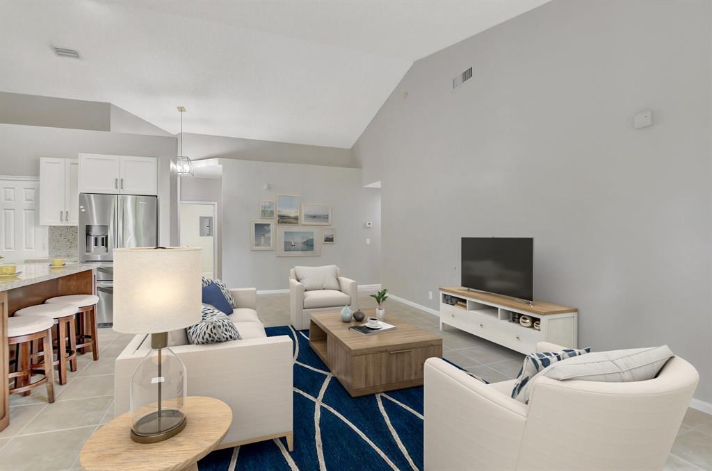 Photo for 5801 Coach House Circle, Unit E, Boca Raton, FL 33486 - Listing #FX-10436780 Sprawl out in the oversized family room for movie night.