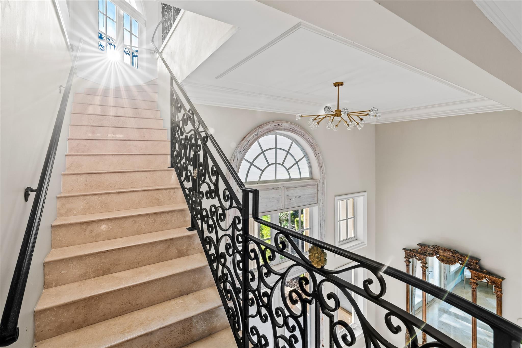 An extraordinary aerial perspective showcases this commanding point estate wrapped in expansive waterfront on multiple sides, complete with impressive deep-water dockage and a private yacht berth. Perfectly positioned at the convergence of premier waterways, this rare property defines elite Fort Lauderdale yachting and coastal living.