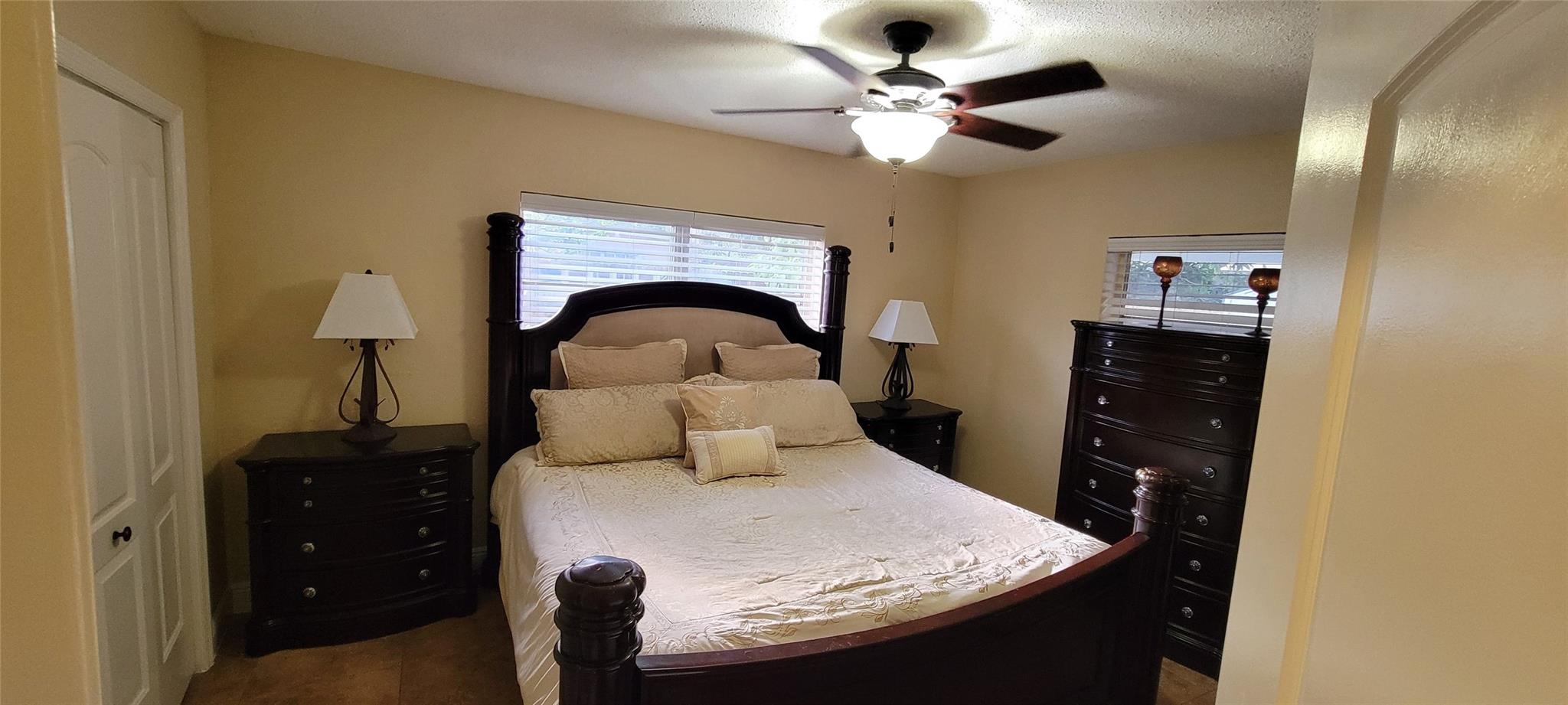 Comfortably sized bedroom with ample natural light.