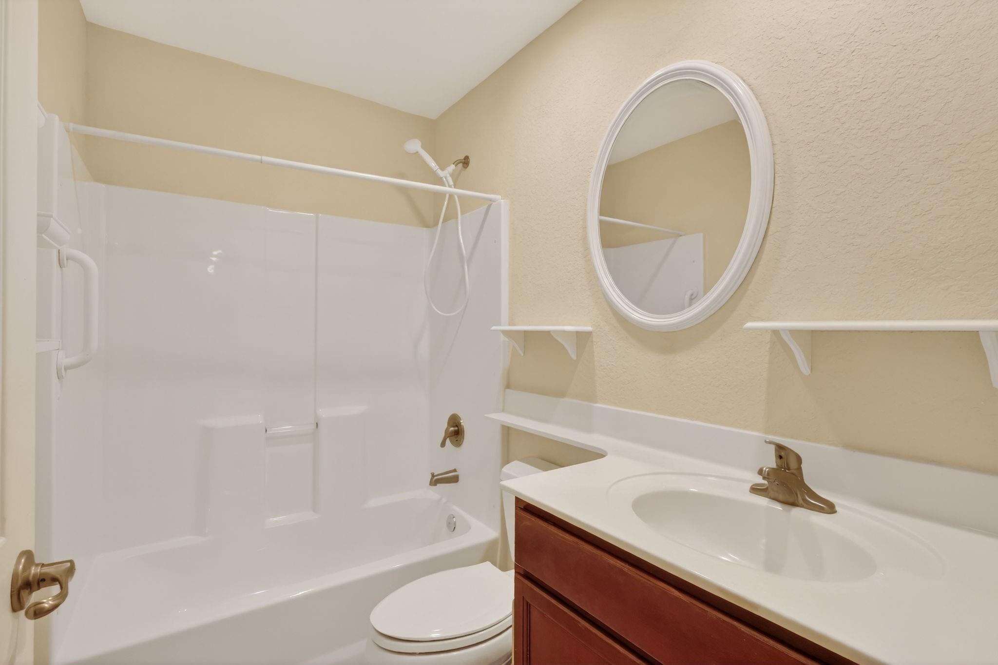 guest bathroom with tub