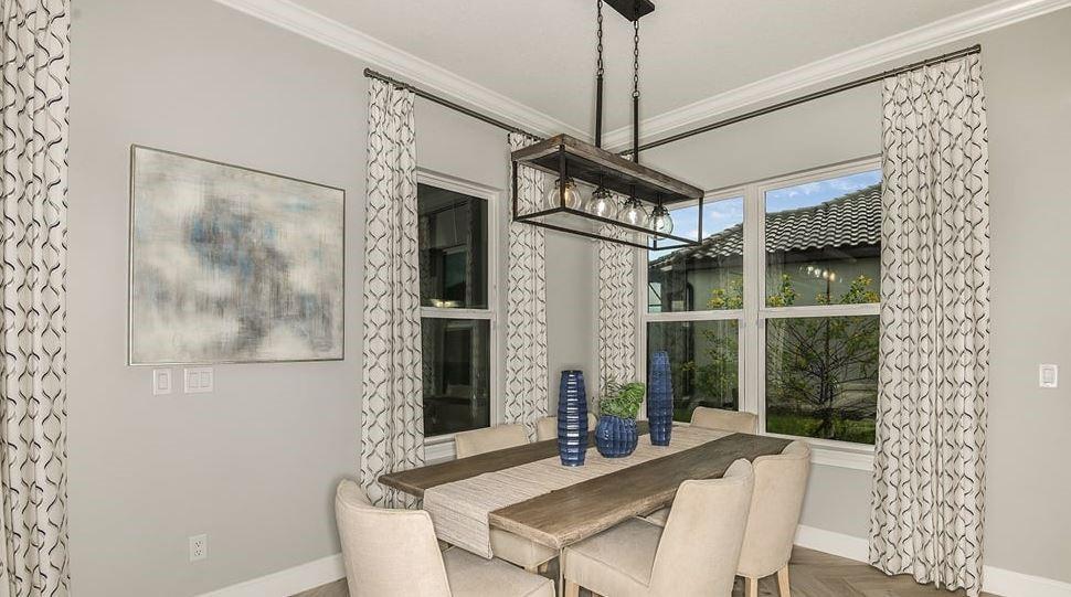 Additional highlights include: tray ceilings, additional bedroom with bathroom, pocket sliding glass door to outdoor living, study, rough-in plumbing for future outdoor kitch