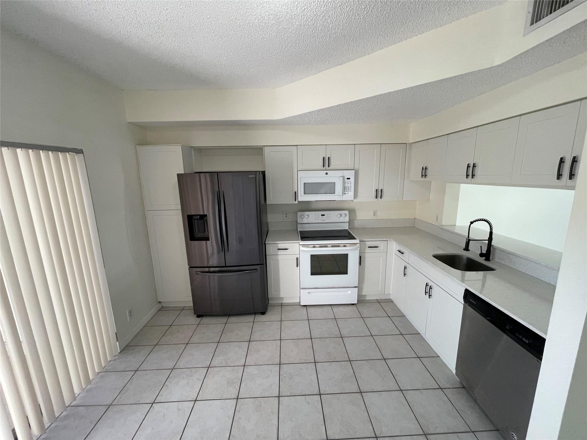 9844 NW 56th Place, Coral Springs, FL 33076