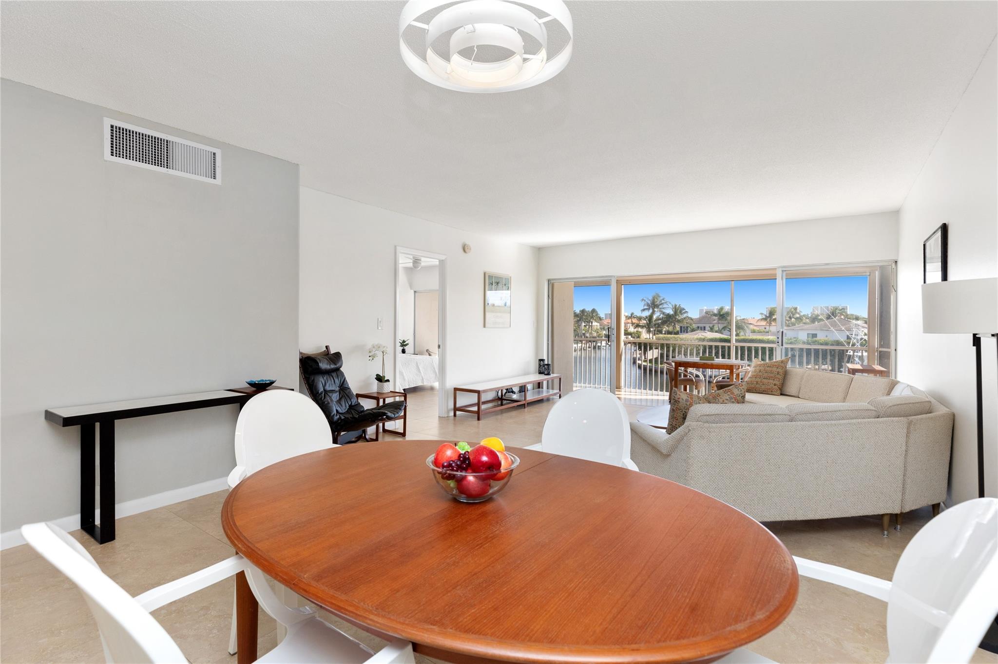 Dining area with living area in background