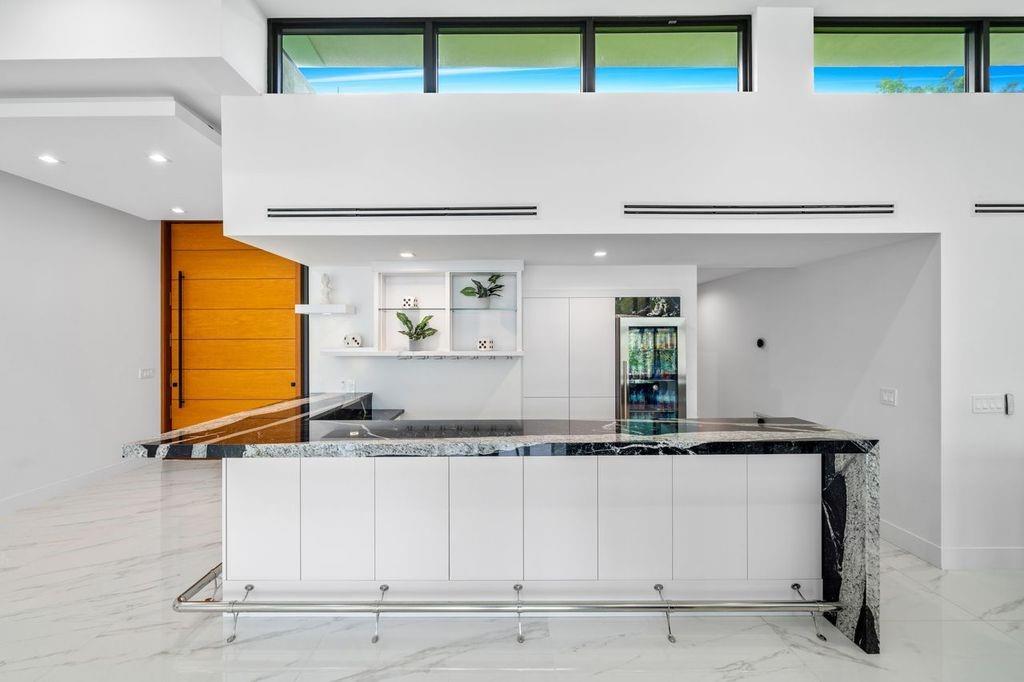 19 Gatehouse Road, Sea Ranch Lakes, FL 33308