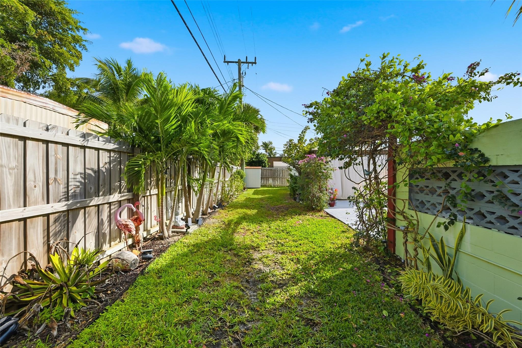 Plenty of grass beyond your pool area.