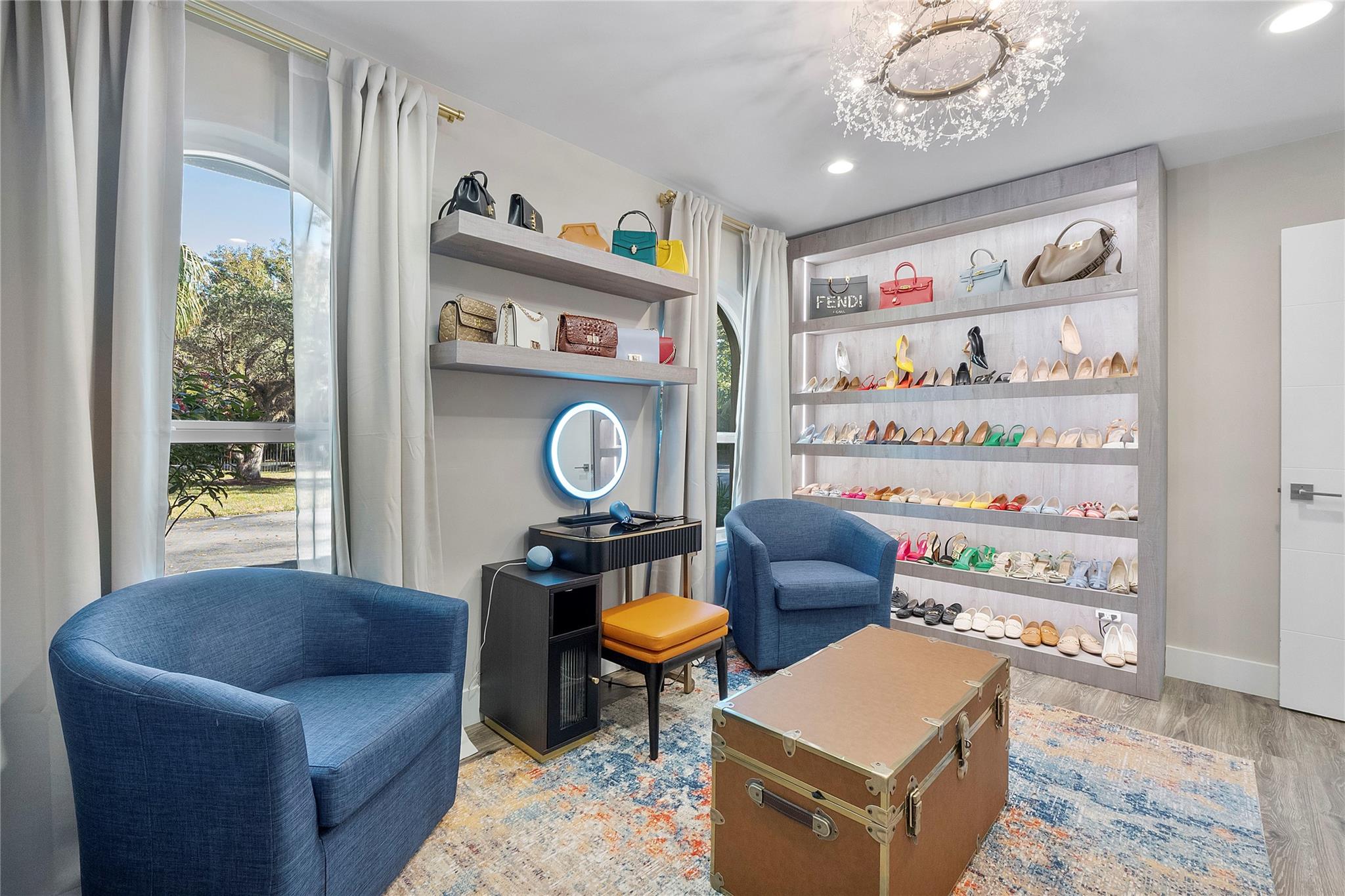 This bedroom has it all, 2 sunny windows & designer closets, shelves & lighting, A King or Queen bed can easily be placed here,