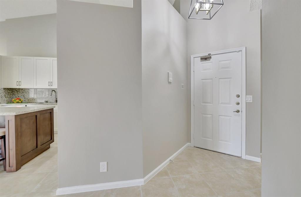 Photo for 5801 Coach House Circle, Unit E, Boca Raton, FL 33486 - Listing #FX-10436780 Foyer entry-notice the gorgeous 18" porcelain tile floors.