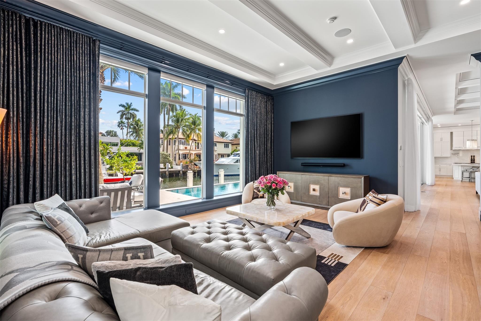 Electric shades allow you to take this room from daytime to nighttime, perfect for movie nights.