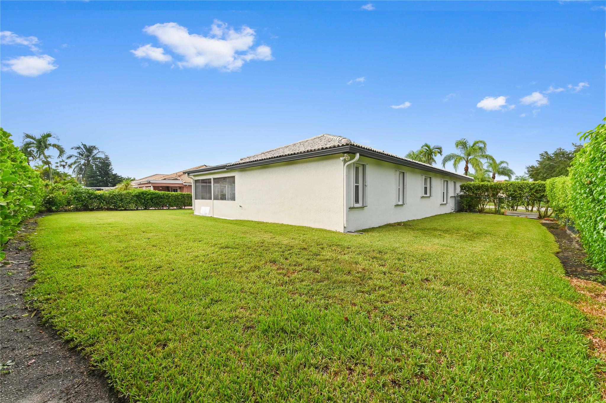 Large lot home has accordion hurricane shutters