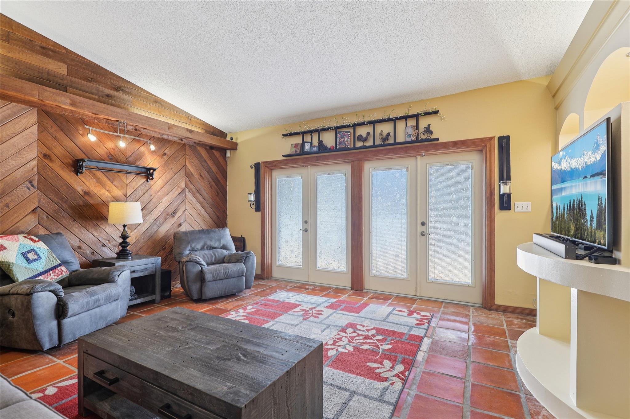 Huge living space allows cozy and open feeling throughout with loads of natural light and comfort.