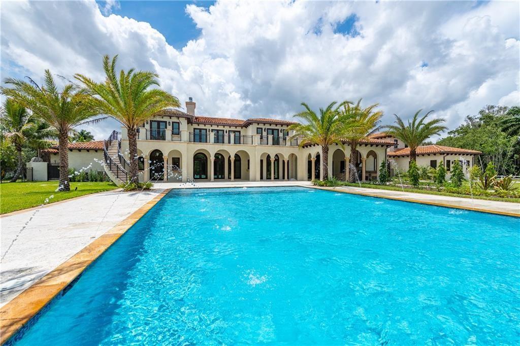 VIEW FROM POOL OF THE BACK OF THE HOUSE