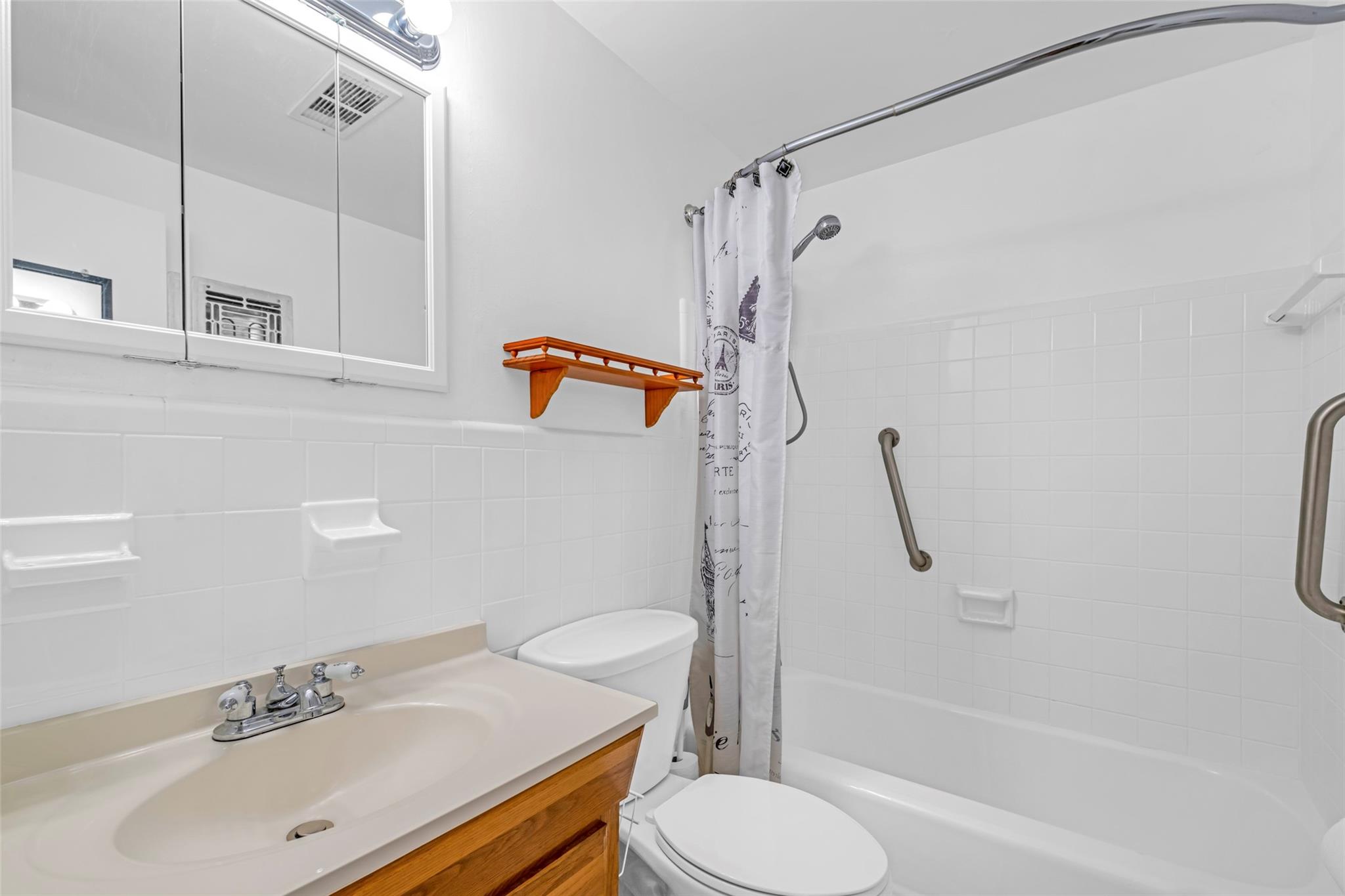 UPDATED BATHROOM , VANITY, TOILET, BATH...