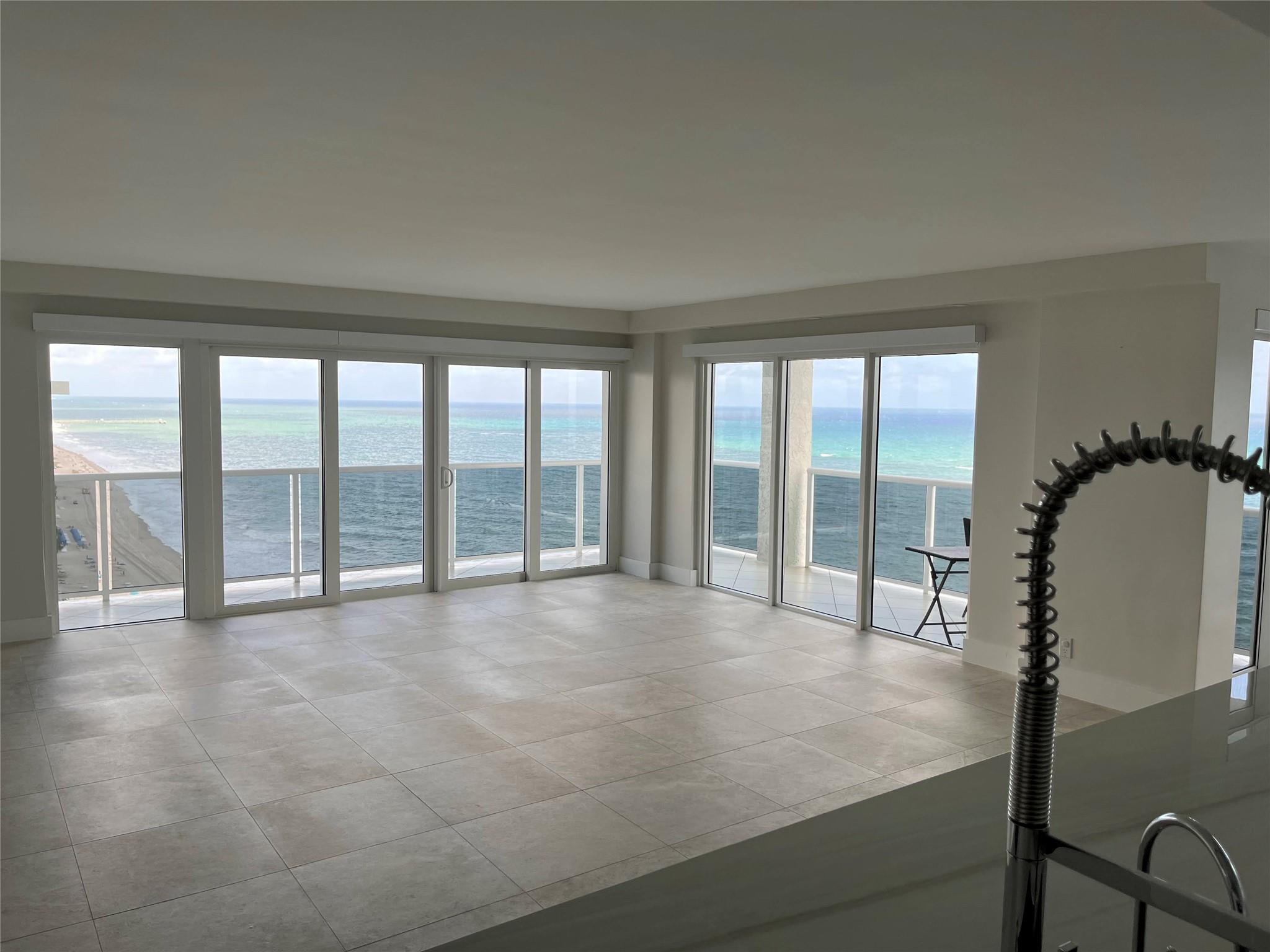 A view of the open floor plan from the kitchen/ entry area.