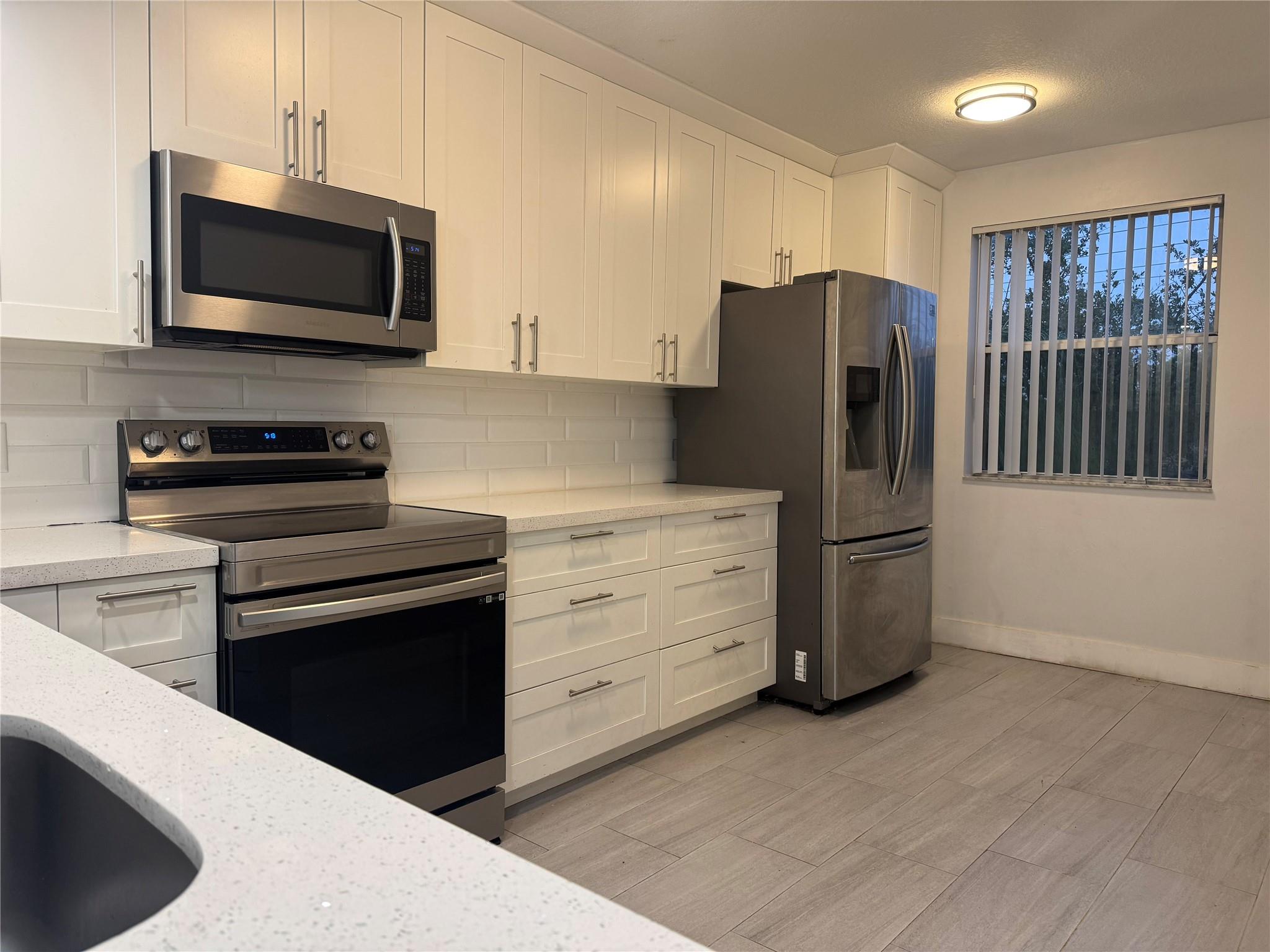 9055 Wiles Road 307, Coral Springs, FL 33067