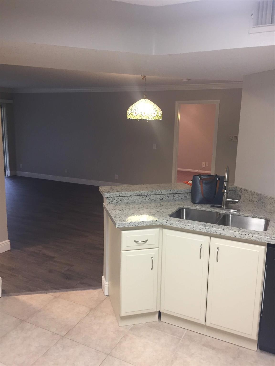 8721 Wiles Road 102, Coral Springs, FL 33067