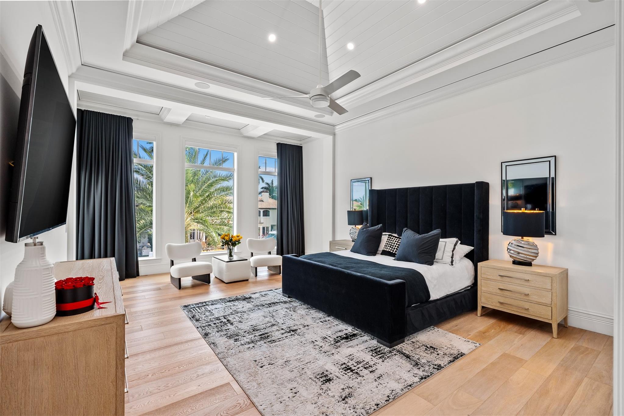 Primary suite with waterfront views and separate his and her bathrooms and closets.