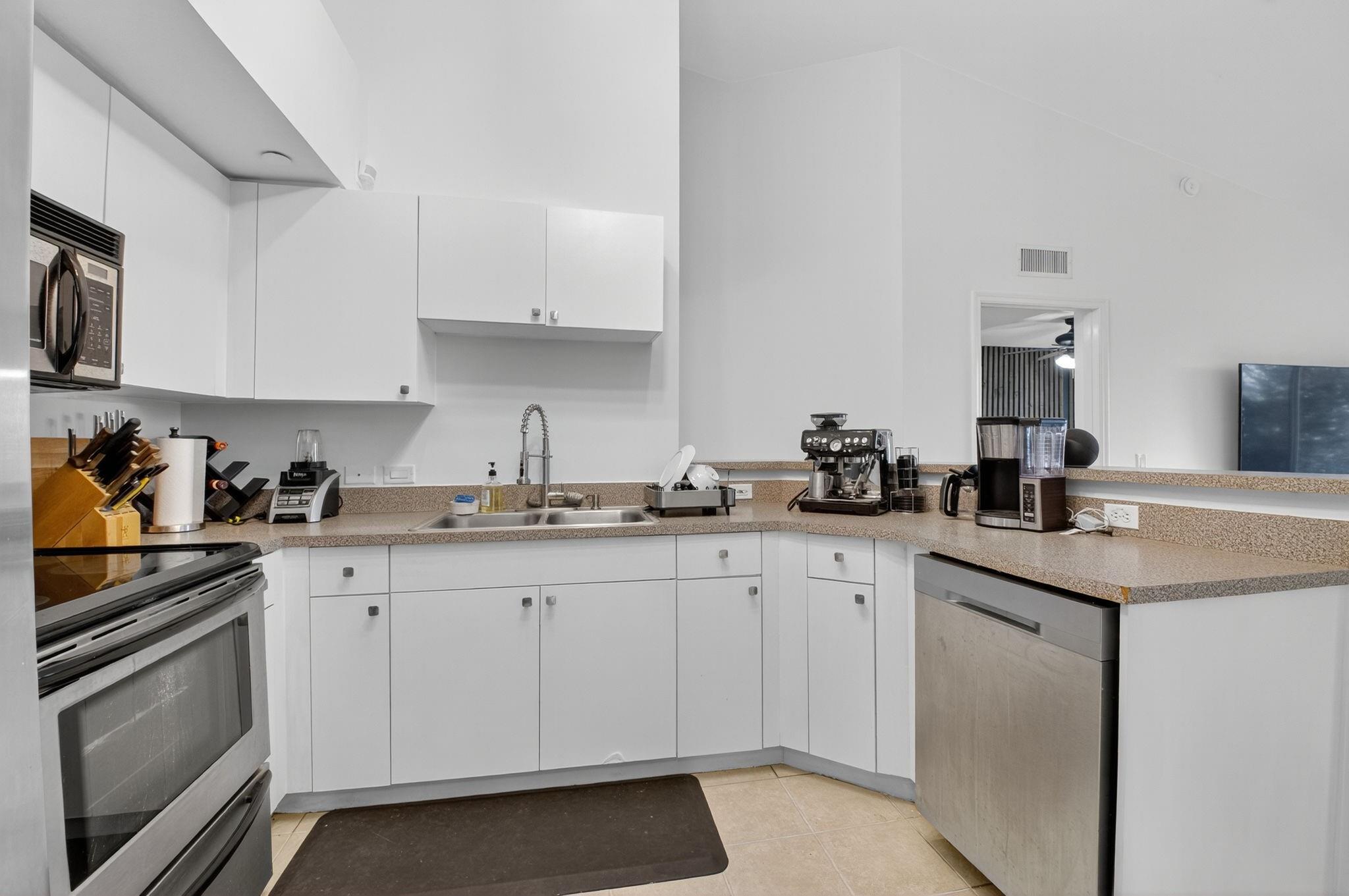 Kitchen also has a dishwasher